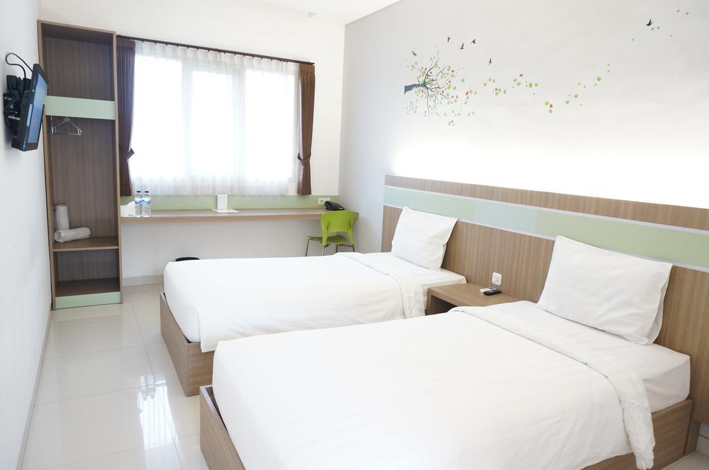 Rumah Cassa Guest House Сурабая Номер фото